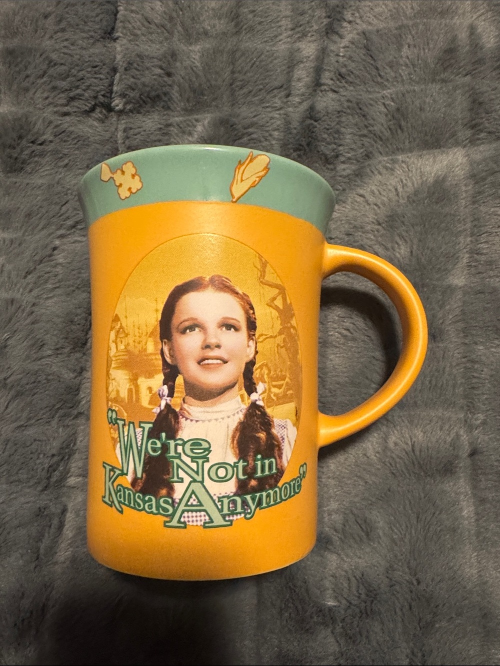 Warner Bros. Yellow & Teal 'We're Not in Kansas Anymore' Wizard of Oz Mug